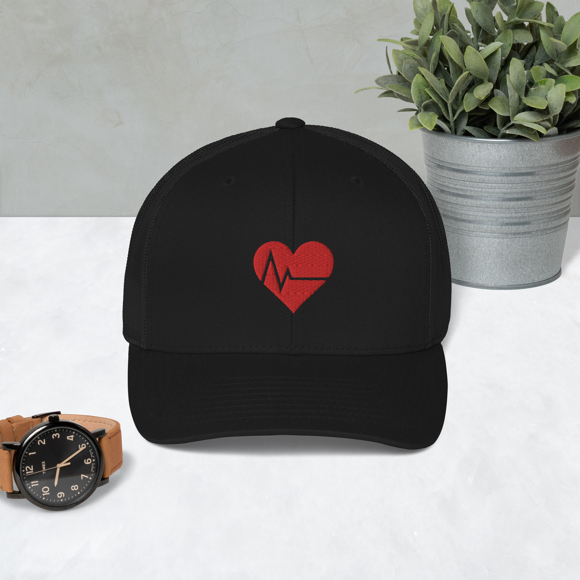 LOVE IS JADED Trucker Cap